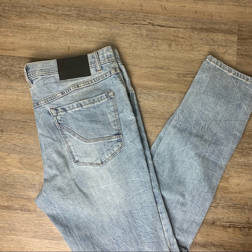 Empyre Light Wash Holey Jeans
L